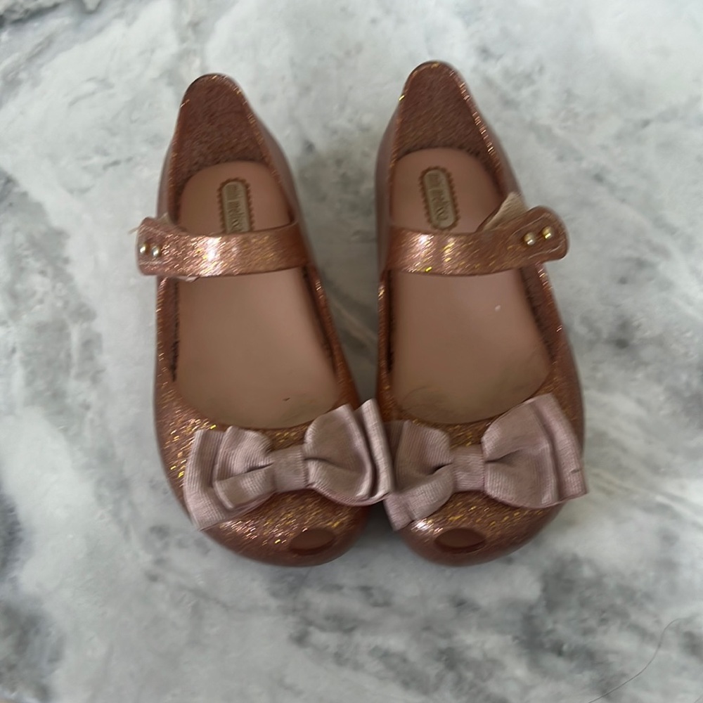 Size 11 Rose gold glitter Mini Melissa’s with bow